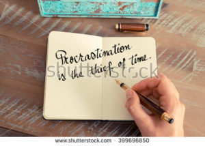 stock-photo-retro-effect-and-toned-image-of-a-woman-hand-writing-on-a-notebook-handwritten-quote-399696850